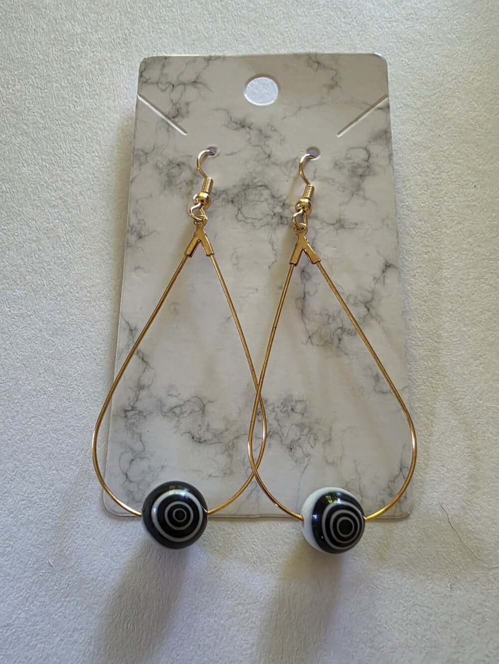 Gold Teardrop Earrings with Black & White Target Beads